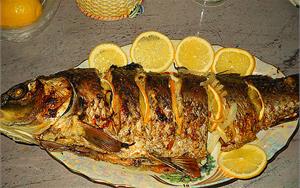 Морской окунь с апельсинами в фольге