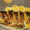 Морской окунь с апельсинами в фольге